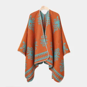 Warmer gestrickter Poncho-Umhang mit orange-blauem Blumenmuster für den Winter