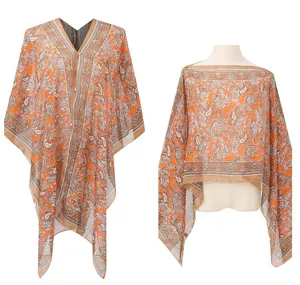 Detailed view of women's orange paisley print chiffon beach cover-up and versatile shawl