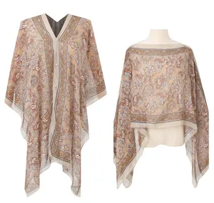 Two different ways to wear a beige paisley chiffon beach cover-up on display mannequins