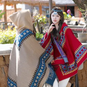 Elegant ethnic style hooded poncho with heart pattern, perfect for travel photography outdoors