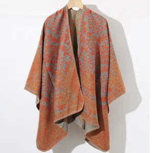 Poncho châle en maille bohème vintage avec des motifs floraux complexes en orange