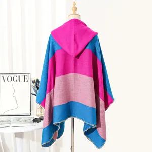 Close-up detail back view of colorful striped hooded knit poncho shawl on fashion mannequin