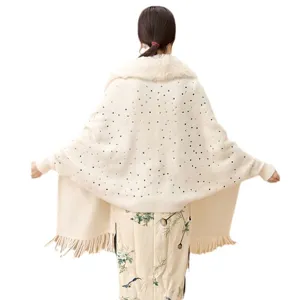 Elegant cream sequin knit shawl with faux fur collar and sleeves shown from back view
