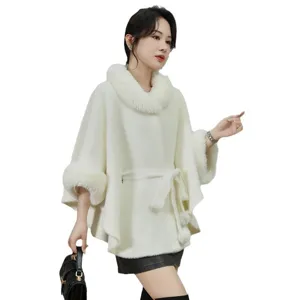 Elegant women's white imitation mink fleece cape featuring a large faux fur collar and belt