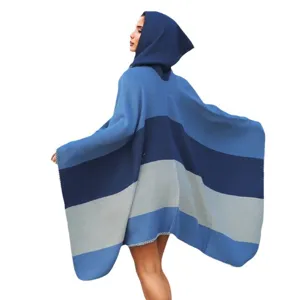 Cozy oversized hooded knit poncho shawl featuring a stylish blue striped pattern for women