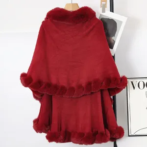 Back view of red double-layered knitted cape with plush faux fur trim detail