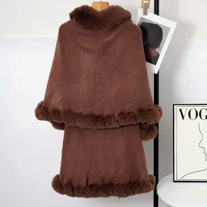 Detailed back view of a brown knitted shawl with plush faux fur collar and trim