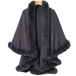 Elegant dark grey knit shawl with plush faux fur collar and trim for winter wear