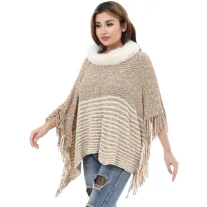 Elegant women's knit poncho shawl with plush faux fur collar and fringe hem detailing
