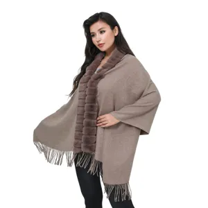 Elegant taupe knitted wrap shawl featuring a faux fur collar and decorative tassel hem