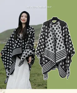 Vintage ethnic knit hooded poncho shawl with a stylish black and white geometric pattern