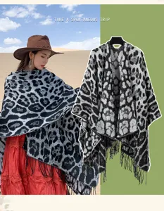 Detailed view of leopard print knit shawl with fringe tassels in a desert setting