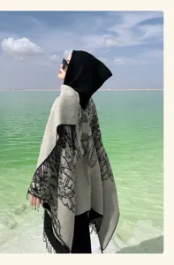 Elegant ethnic style hooded poncho shawl with tassels and vintage patterns for travel