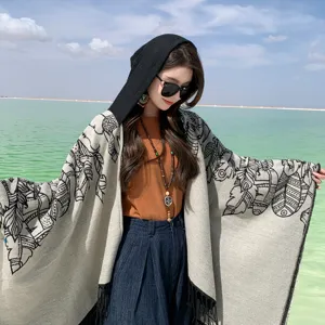 Ethnic style hooded poncho shawl with feather print and tassels for outdoor travel
