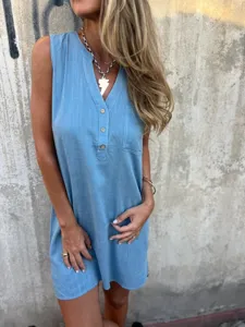 Close-up view of the light blue sleeveless cotton linen dress with a V-neckline.