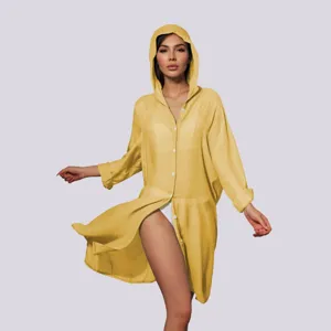 Detailed close-up of the women's yellow hooded long sleeve beach cover-up shirt.