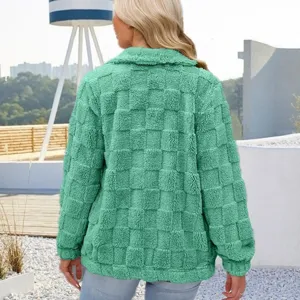 Detail view of the women's green checkered plush fleece zip cardigan winter jacket.
