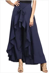 Detail view of women high waist wide leg chiffon pants with bow tie and ruffle overlay.