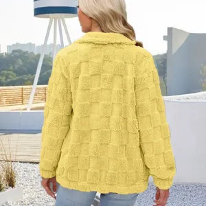 Back view detail of women yellow fuzzy checkered fleece cardigan, soft texture close-up.