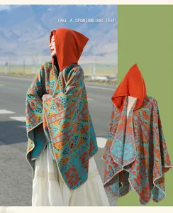 Outdoor scenery and mannequin display of a retro ethnic hooded poncho with geometric patterns