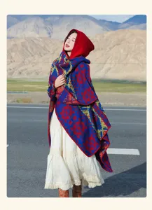 Detailed view of a thick retro hooded shawl with vibrant ethnic geometric patterns.