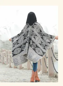 Back view of a retro ethnic style women's hooded poncho with geometric patterns