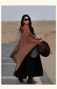 Hooded knit poncho featuring ethnic geometric patterns for retro autumn travel style