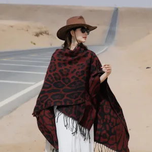 Stylish leopard print knitted shawl with tassels for travel and outdoor photos