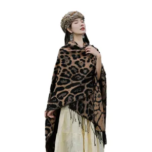 Stylish leopard print knitted shawl with tassels for women travel and photography