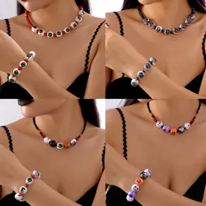 Halloween beaded necklace and bracelet set featuring spooky eyeball and bat designs
