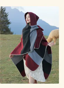 Detailed view of women's hooded ethnic style striped shawl poncho wrap for winter travel