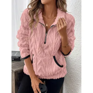 Vrouwen roze pluizige fleece trui met halve rits en zakken voor de koude winter