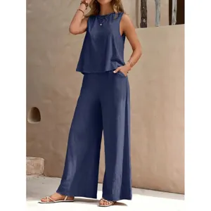 Ensemble deux pieces haut sans manches bleu marine et pantalon large femme detail