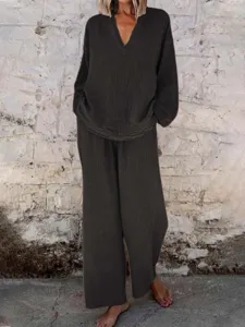 Casual solid color V-neck long sleeve top and wide leg pants two piece outfit for women.