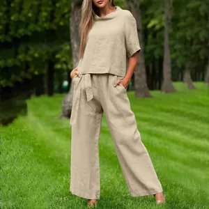 Women casual linen two piece set short sleeve top wide leg pants summer outfit details.
