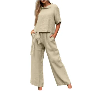 Casual summer women two-piece set short sleeve top and wide leg pants with tie belt.