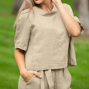 Casual linen two piece set featuring a short sleeve crewneck top and matching lounge pants.