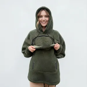 Detailed view of the dark green sherpa fleece hoodie, showcasing soft fabric and cozy hooded style.