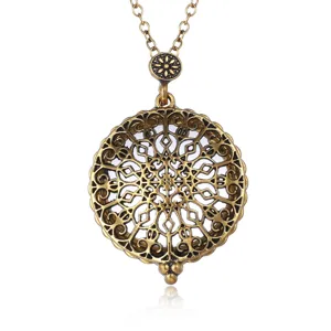 Vintage bronze hollow filigree magnifying glass pendant necklace with sweater chain