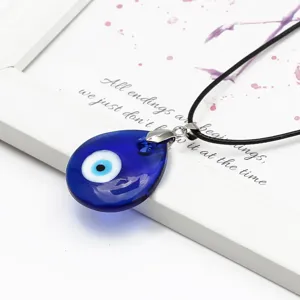 Blue teardrop evil eye pendant necklace featuring a traditional Turkish eye design