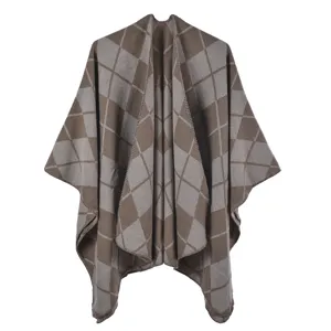 Close-up view of the vintage diamond plaid pattern on this thick warm winter poncho shawl