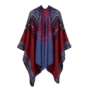 Vintage ethnic style warm poncho shawl with geometric totem pattern in red and blue