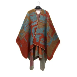 Retro ethnic style thick knit shawl poncho with colorful geometric patterns for winter