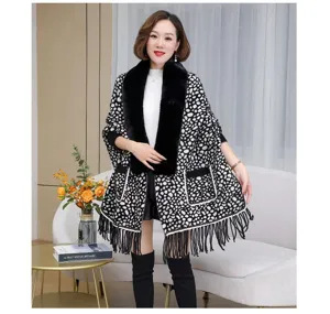 Elegant leopard knit shawl for women featuring a large faux fur collar and stylish fringe trim