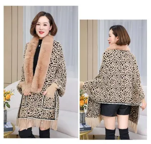 Elegant leopard print knitted poncho with large faux fur collar and fringe detail for winter