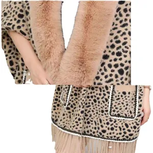 Winter leopard print knit cape shawl with large faux fur collar and fringe trim.