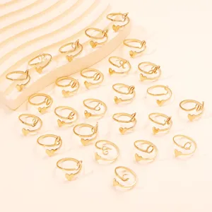 Detailed view of 26 gold stainless steel alphabet rings with elegant heart design