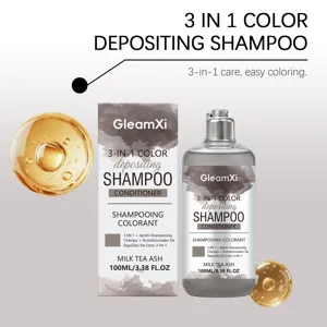 Detailansicht der 3-in-1 Farbschutz-Shampoo und Conditioner Flasche mit goldenen Wassertropfen.