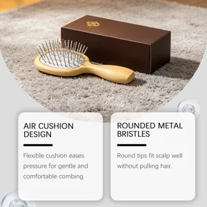 Brosse à cheveux en bois avec picots métalliques et coussin d'air pour un coiffage doux