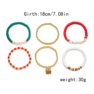 Set di 6 braccialetti natalizi con perline di argilla e scritte MERRY e BELIEVE